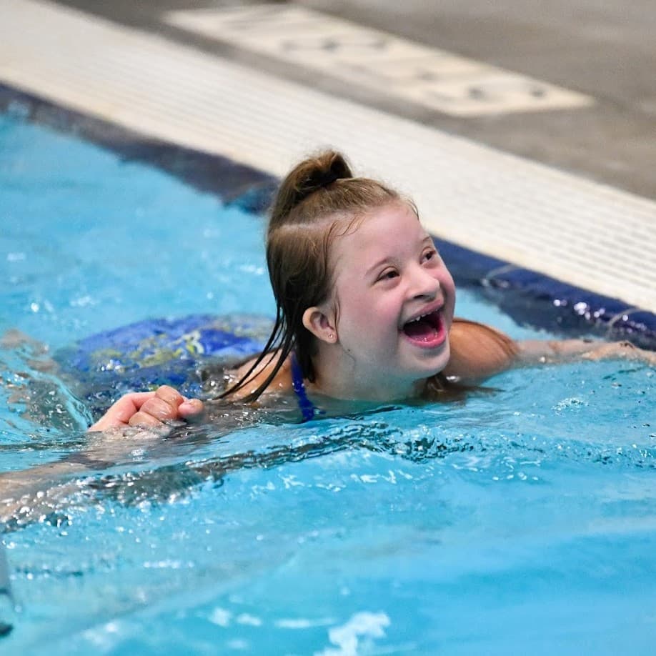 Addison swims during Tri My Best Triathalon